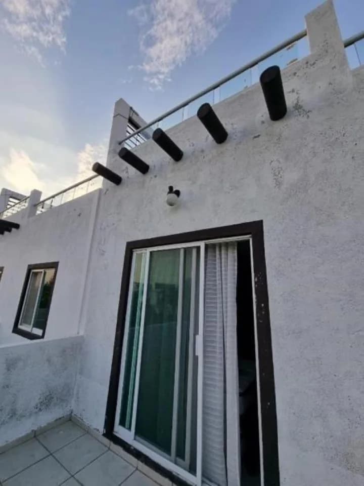 Terraza exterior de la casa en condominio en Oaxtepec, Yecapixtla.